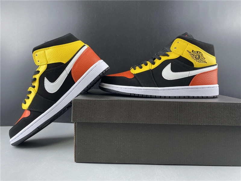 Jordan 1 Mid Black Amarillo Orange - 852542-087