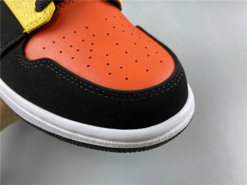 Jordan 1 Mid Black Amarillo Orange - 852542-087