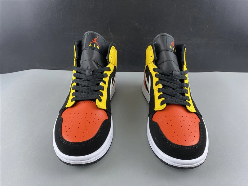 Jordan 1 Mid Black Amarillo Orange - 852542-087
