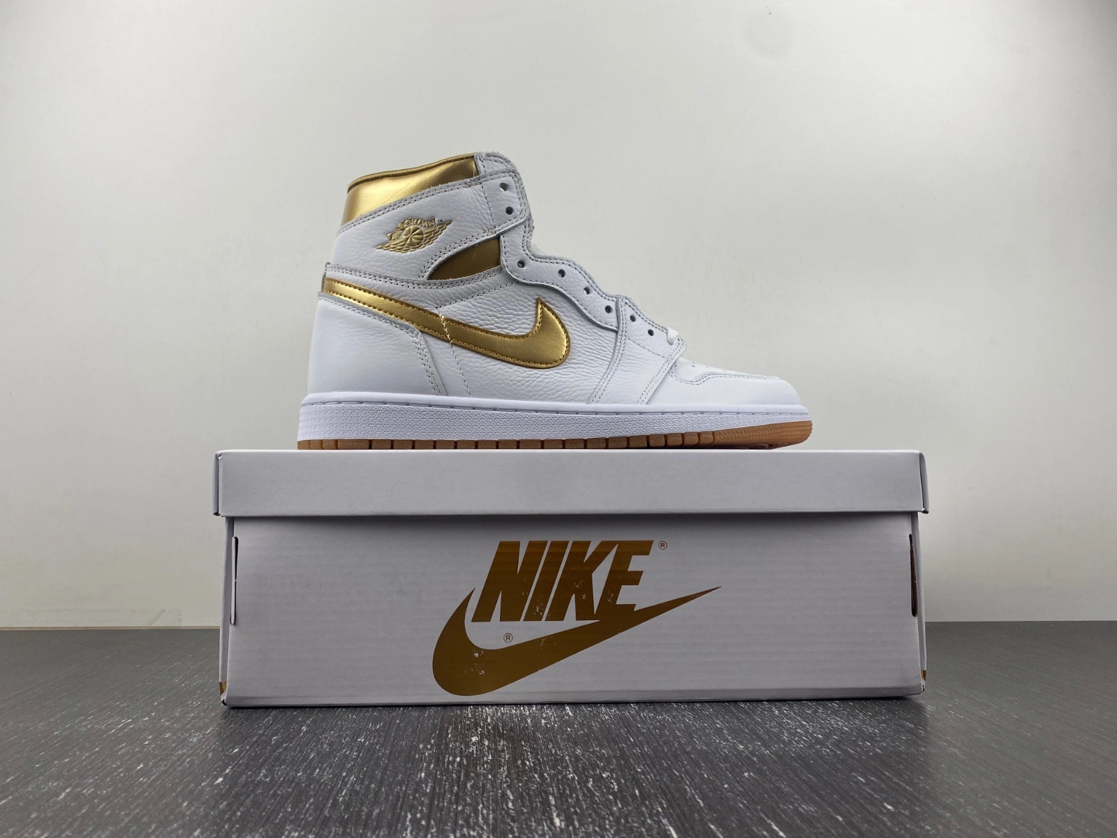 Jordan 1 Retro High OG Metallic Gold (Women's)  FD2596-107