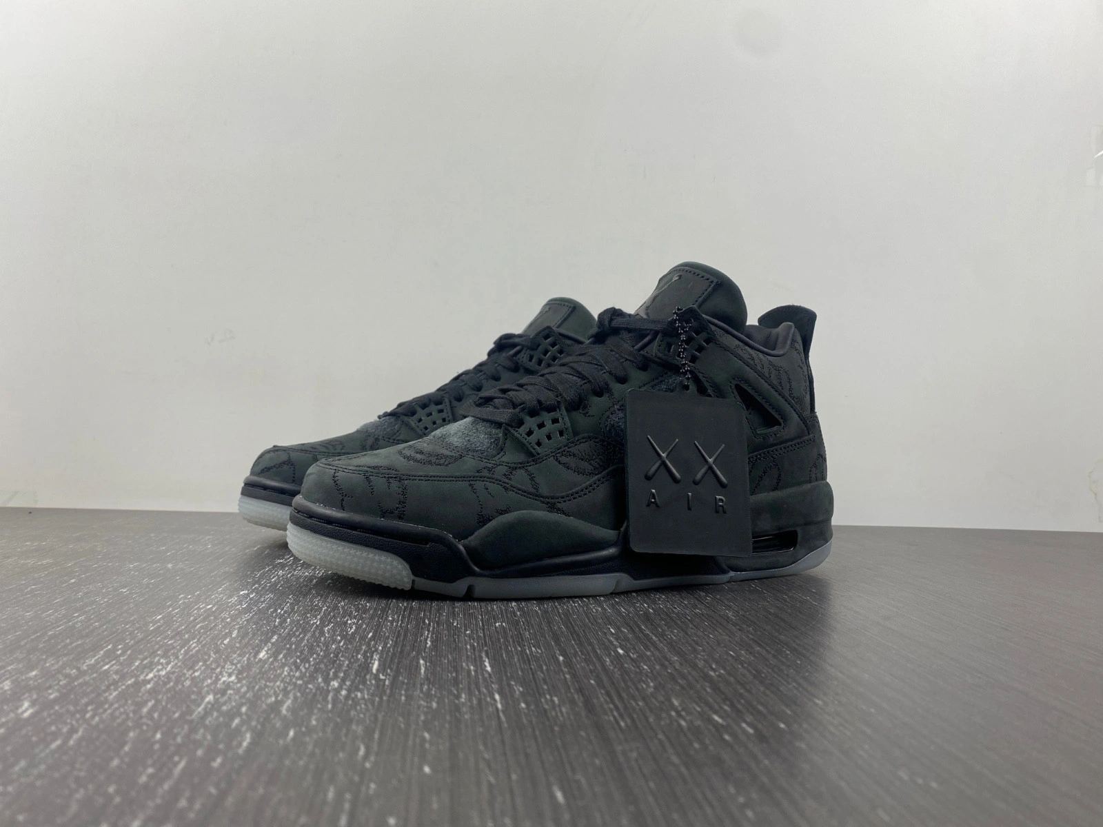 KAWS x Air Jordan 4 Retro 'Black' - 930155 001