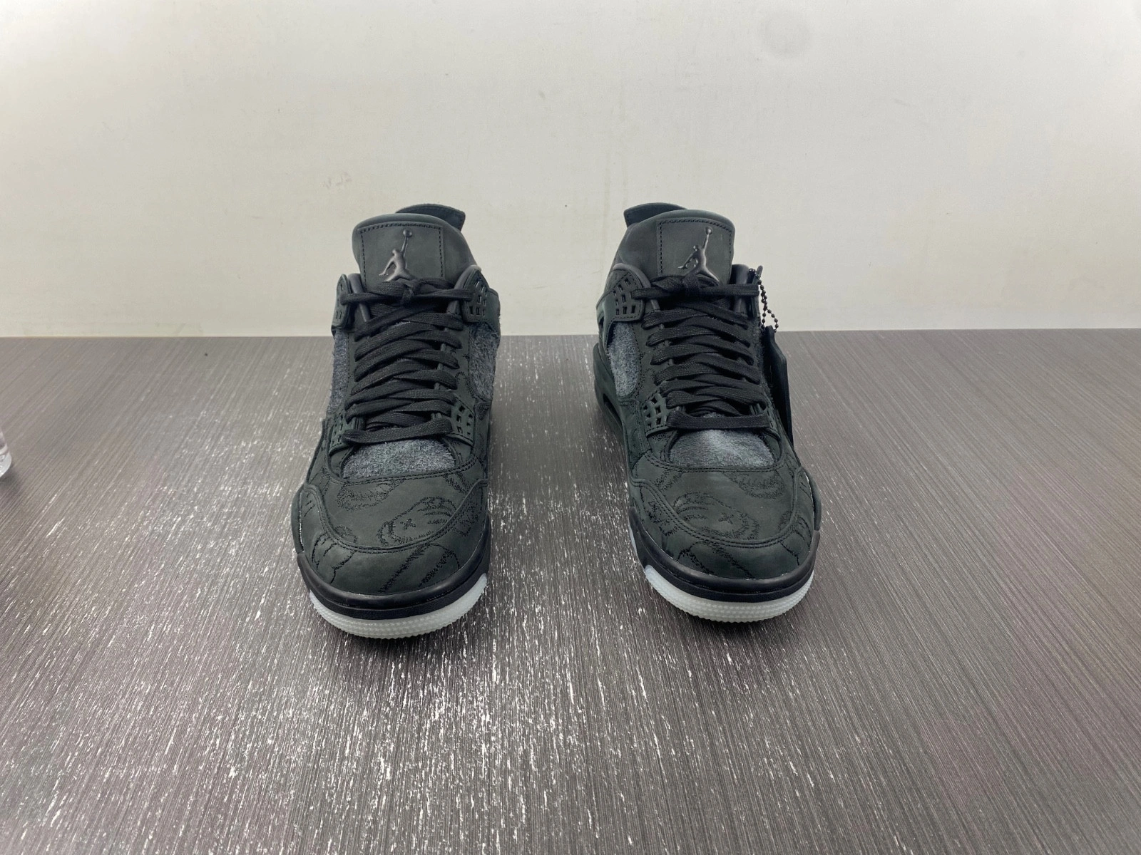 KAWS x Air Jordan 4 Retro 'Black' - 930155 001
