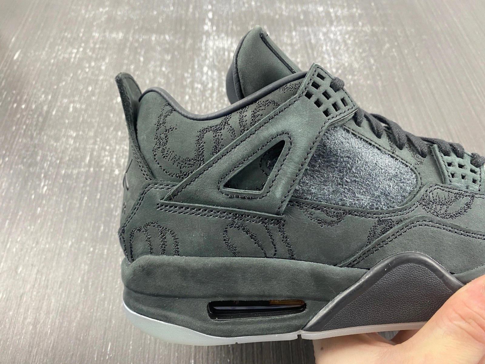 KAWS x Air Jordan 4 Retro 'Black' - 930155 001