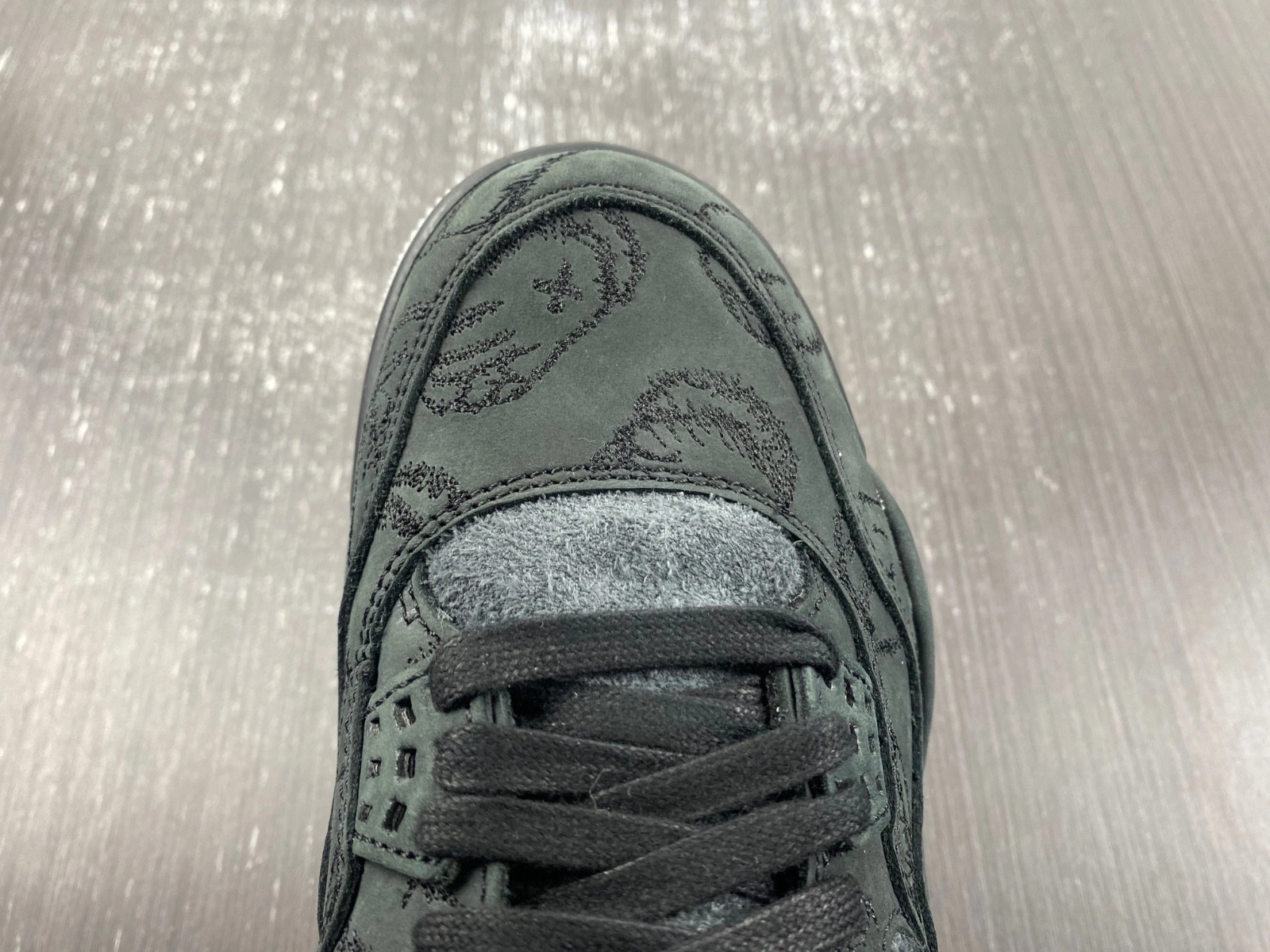 KAWS x Air Jordan 4 Retro 'Black' - 930155 001