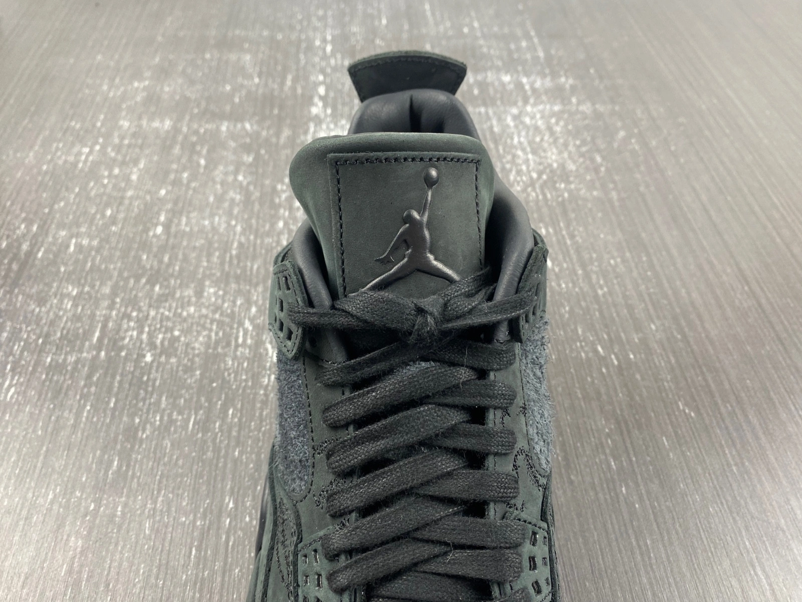 KAWS x Air Jordan 4 Retro 'Black' - 930155 001