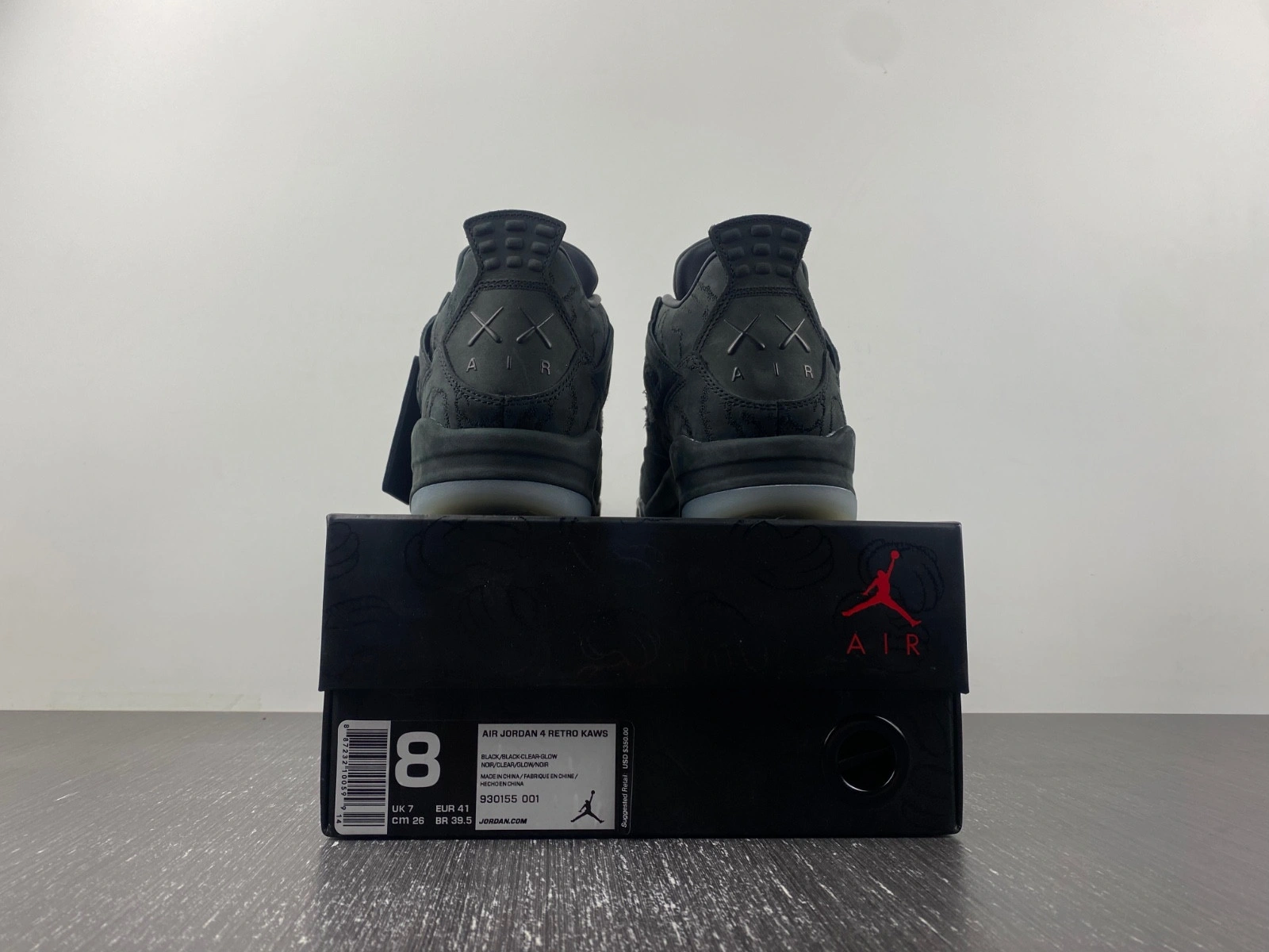 KAWS x Air Jordan 4 Retro 'Black' - 930155 001