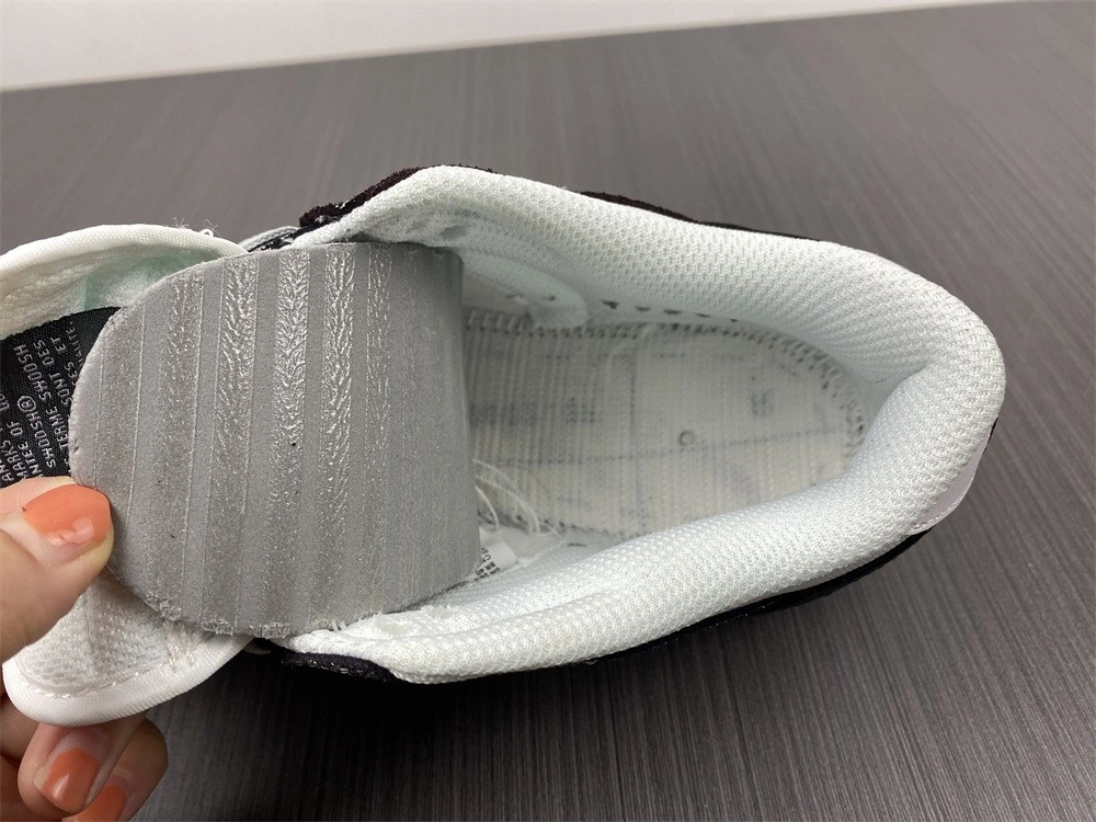 The Nike Dunk Low Features Silver Cracked Leather  DO5882-001