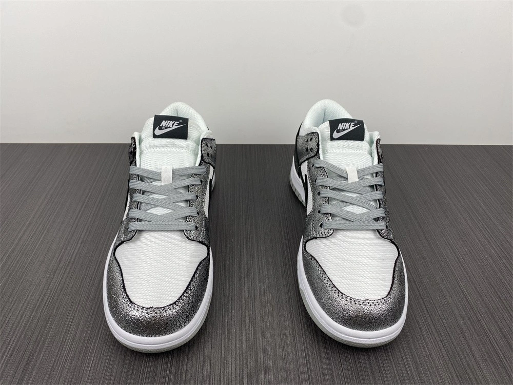 The Nike Dunk Low Features Silver Cracked Leather  DO5882-001