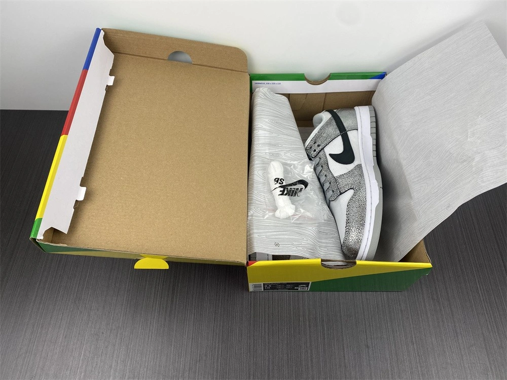The Nike Dunk Low Features Silver Cracked Leather  DO5882-001