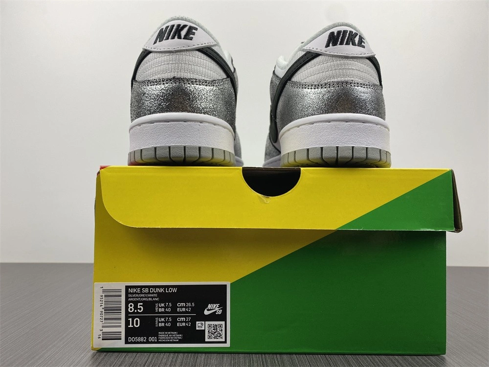 The Nike Dunk Low Features Silver Cracked Leather  DO5882-001