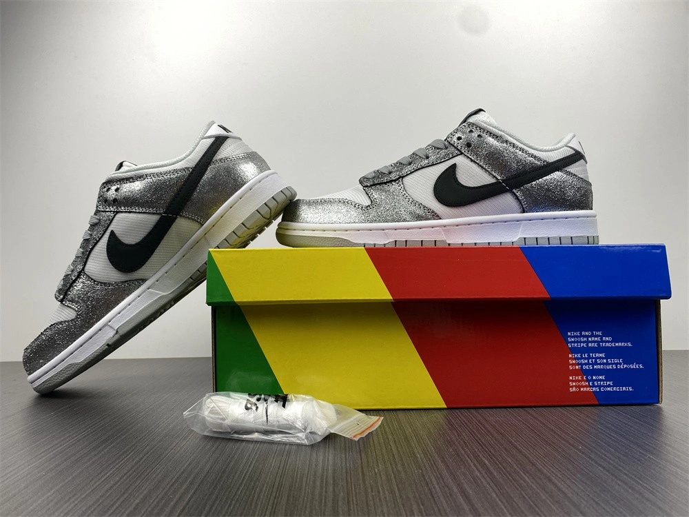 The Nike Dunk Low Features Silver Cracked Leather  DO5882-001
