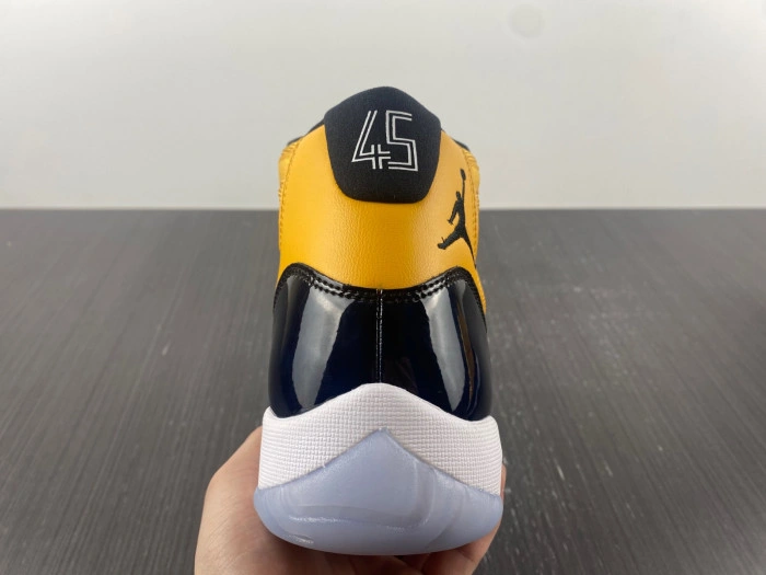 Air Jordan 11 black and yellow