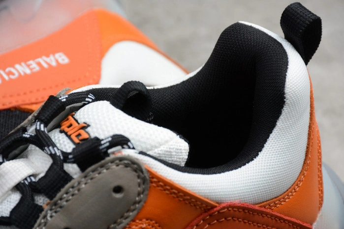BLCG TRIPLE TRAINER 'BLACK ORANGE' 541624 W09E1 1766