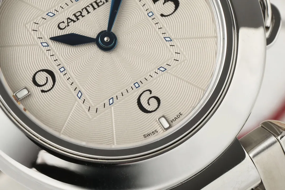 Cartier Pasha de Cartier Stainless Steel Automatic Watch with White Dial, Blue Hands, and Sapphire Crystal – Silver Tone Bracelet FashionForward 2814