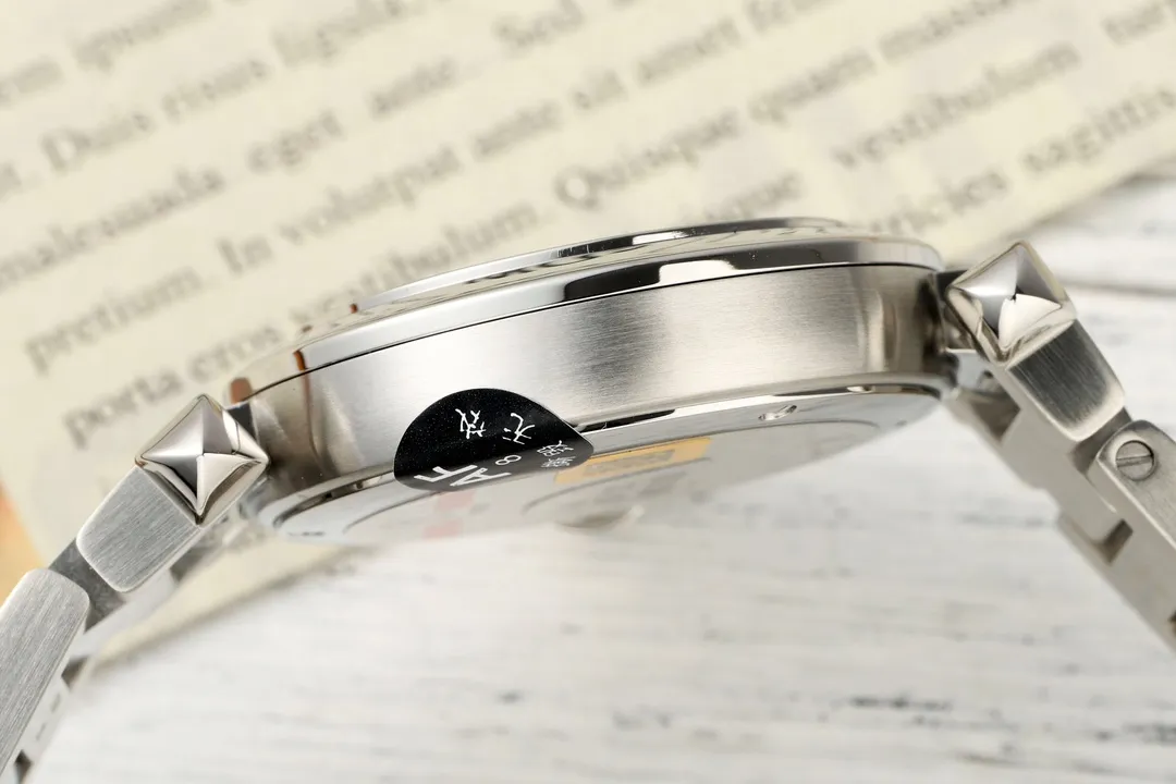 Cartier Pasha de Cartier Stainless Steel Automatic Watch with White Dial, Blue Hands, and Sapphire Crystal – Silver Tone Bracelet FashionForward 2814