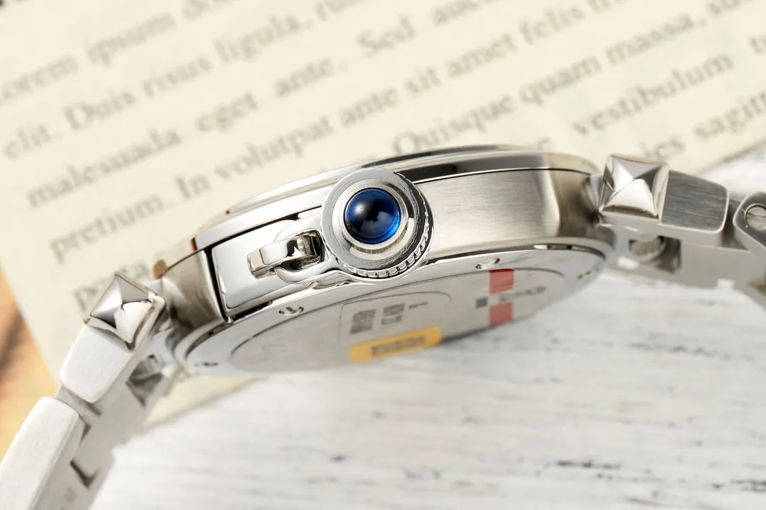 Cartier Pasha de Cartier Stainless Steel Automatic Watch with White Dial, Blue Hands, and Sapphire Crystal – Silver Tone Bracelet FashionForward 2814