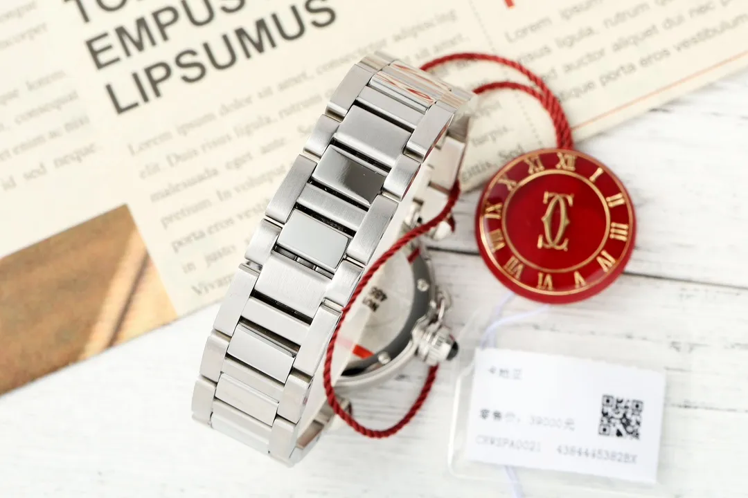 Cartier Pasha de Cartier Stainless Steel Automatic Watch with White Dial, Blue Hands, and Sapphire Crystal – Silver Tone Bracelet FashionForward 2814