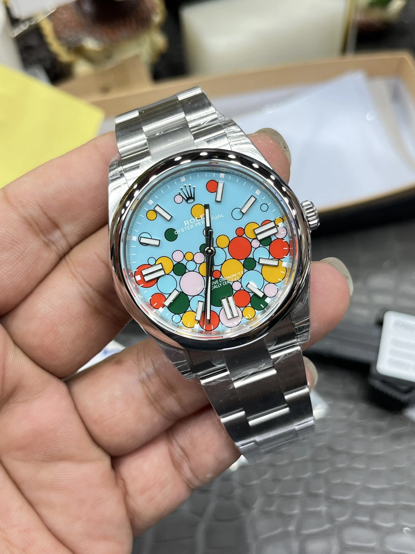 HighQuality CBD Factory Rolex Oyster Perpetual 41mm “Celebration Bubble” Motif Dial Smooth Bezel Oyster Bracelet (124300) 1:1 Super Clone – DD3230 Movement 165