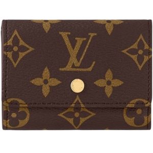 M68704 Monogram coated canvas Black Cowhide-leather lining Press-stud closure Micro Wallet